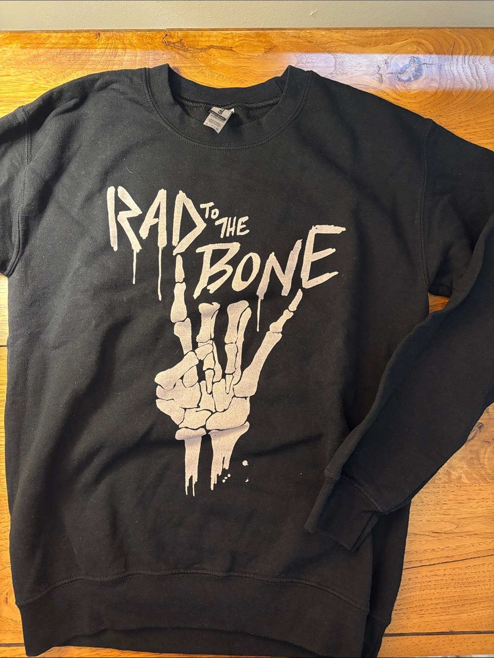 Gildan Black Sweatshirt with White "Rad to the Bone" Skeleton Hand Graphic